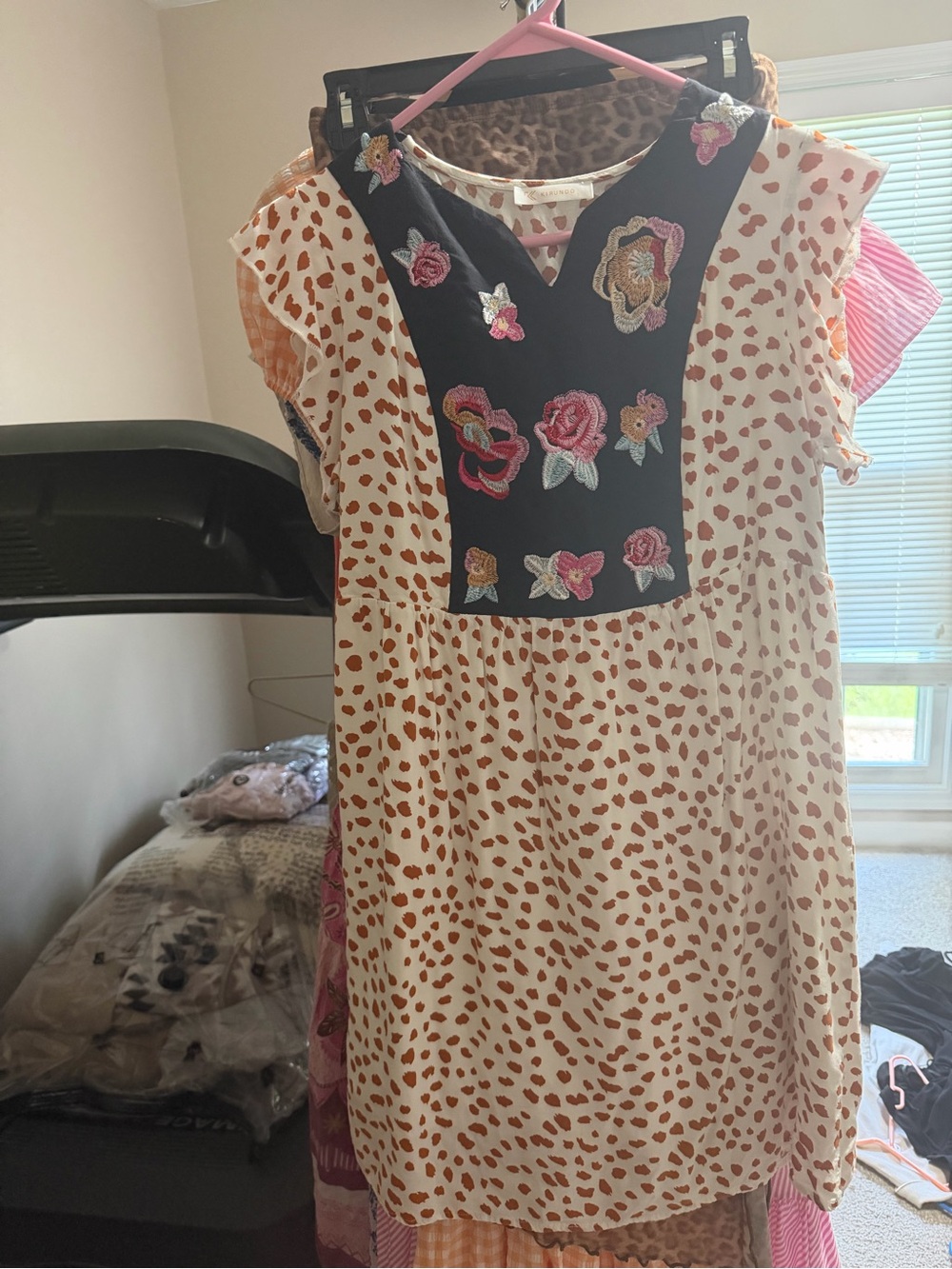 Girls Cream Dress with Brown Spot Print and Black Floral Bib